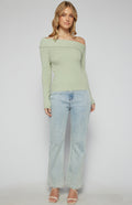 women wearing sage green one shoulder knit top